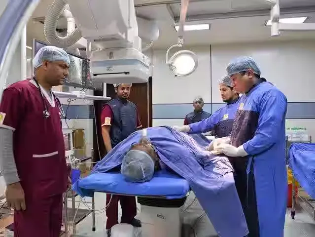 Dr. Adarsh Kumar performing surgery with specialized team