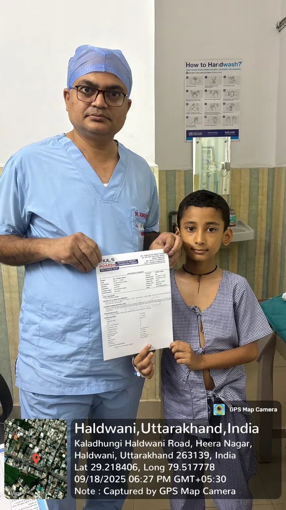 Dr. Adarsh Kumar friendly checkup with young patient